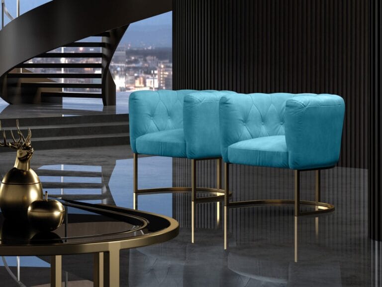 A pair of modern blue upholstered chairs with gold legs are placed in a sleek, dark room with a spiral staircase and city view in the background.